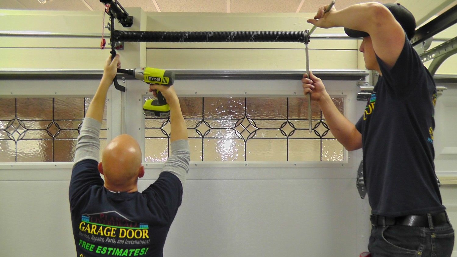 installers-working Overhead Door Repair: Why It Is Important To Hire a Professional?
