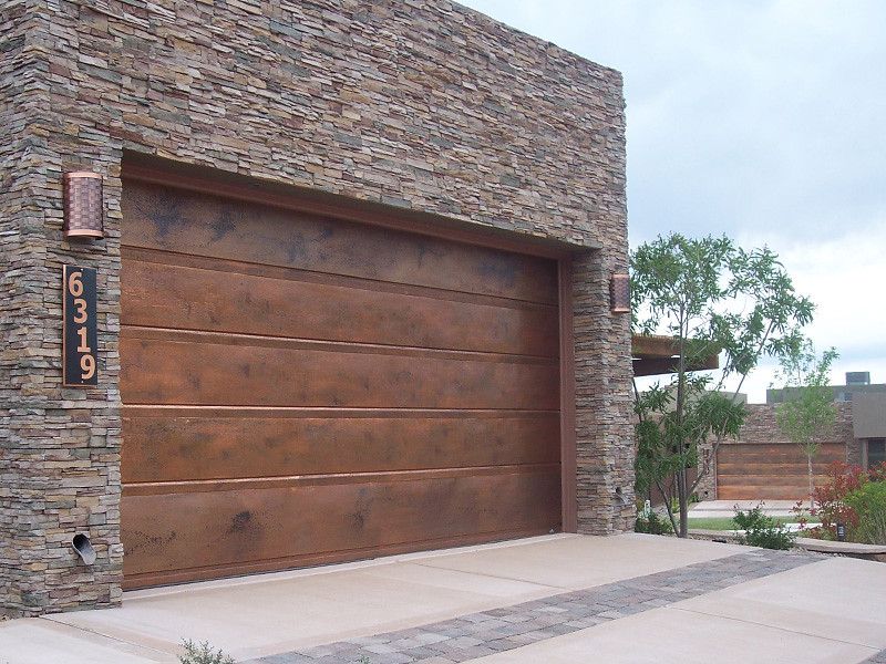 5169254687_d3c6da3df2_b Maintenance of garage doors will cost you less during Commercial Door Repair
